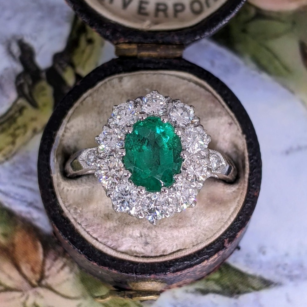 Emerald and Diamond Cluster Ring set in Platinum