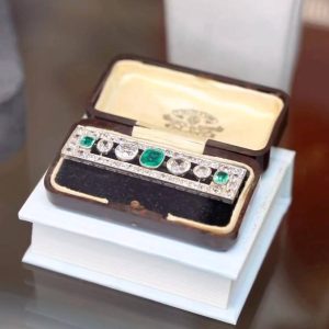 Art Deco Emerald and Diamond Brooch with 10ct+ of Diamond.