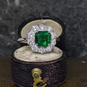 Vintage Emerald and Diamond Cluster Ring in Platinum