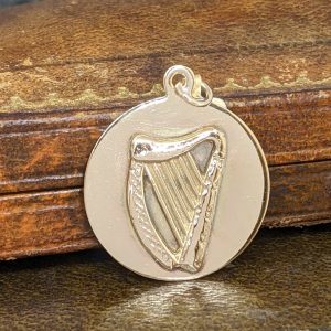 SOLD - Vintage Harp Charm in 9k Gold - 1971